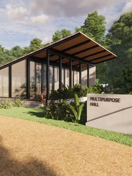 This is a proposed design for a multipurpose hall at a resort in Sakleshpur. The glass walls and angled roof are designed to make the structure feel light and connected to the surrounding forest.