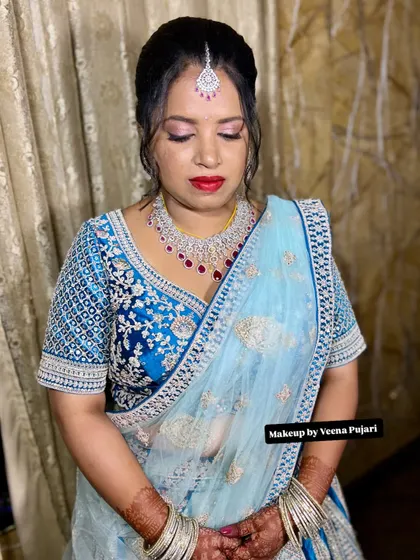 Another view of this stunning reception look. The eye makeup is soft and blended, creating a romantic feel that is perfect for an evening of celebration.