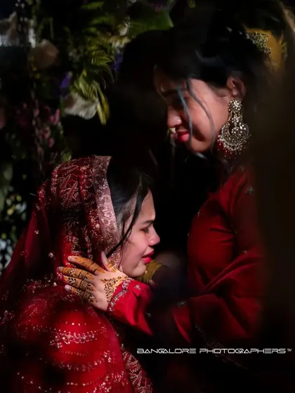 A duplicate of the powerful, emotional embrace between the bride and a loved one. This moment is so significant it deserves to be seen.