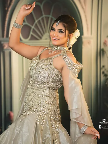 A joyful and candid shot, showing that the makeup looks beautiful whether posed or in motion.
