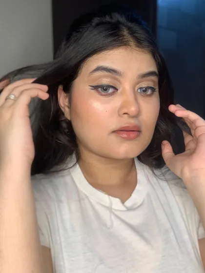 A close-up of the clean, precise winged eyeliner.