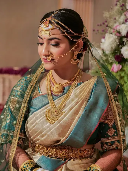 A closer view of the Coorgi bridal makeup, featuring a defined eye, a traditional nose ring (nath), and flawless skin.