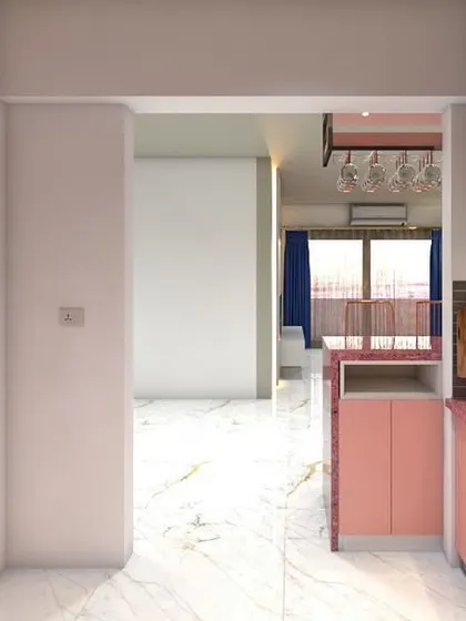 A kitchen view from the entryway, featuring a pink granite countertop and a mix of cabinet styles. This design demonstrates how we tailor layouts to fit unique room shapes and client preferences.