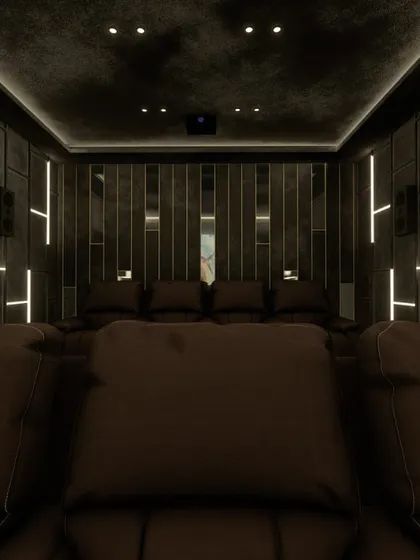 Another perspective of the front of the theater, highlighting the textured ceiling and the clean, modern aesthetic.
