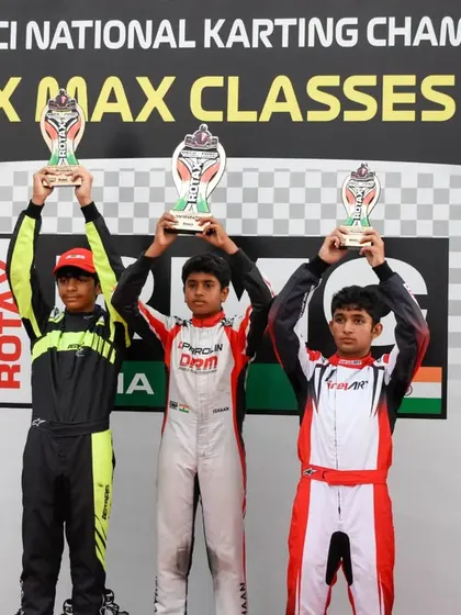 Another view of our drivers celebrating a double podium finish. This level of team success is a direct outcome of our collaborative engineering and coaching efforts.