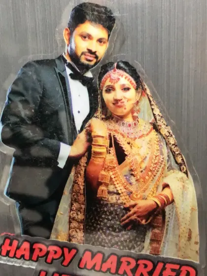 An acrylic cutout magnet for a 'Happy Married Life,' featuring a beautiful wedding photo.