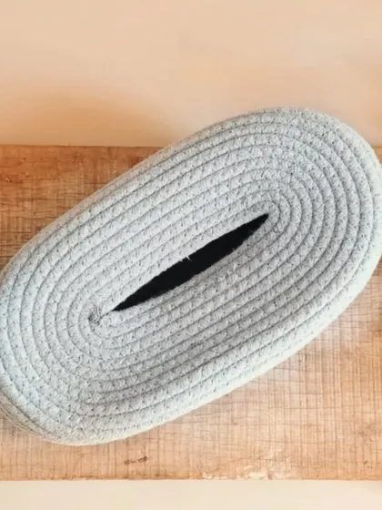 A top-down view of the oval rope tissue basket, highlighting its neat, woven texture. It's a simple yet stylish upgrade from a standard cardboard box.