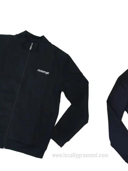 A custom black zip-up jacket with a simple, clean logo for 'Riseup.' This demonstrates our minimalist branding options for a professional and modern look.