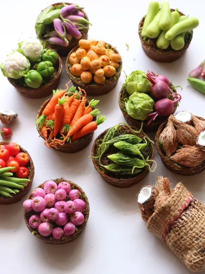 A beautiful flat lay of all the miniature vegetables, including the bonus sack of coconuts.