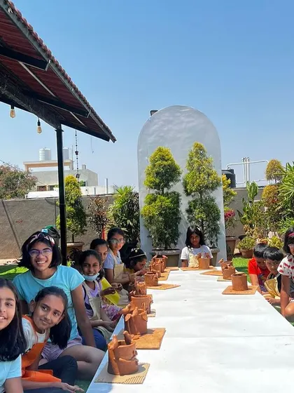 Our sunny terrace is the perfect spot for outdoor art activities like this pottery session during our summer camp. The kids loved getting their hands messy with clay.
