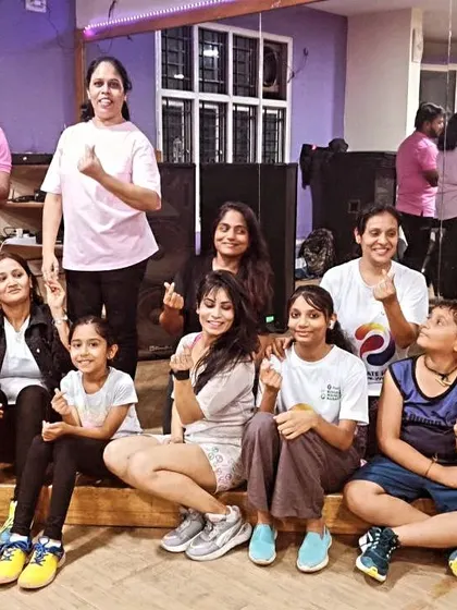 A series of group photos from our Women's Day celebration. So much love and positive energy in one room.
