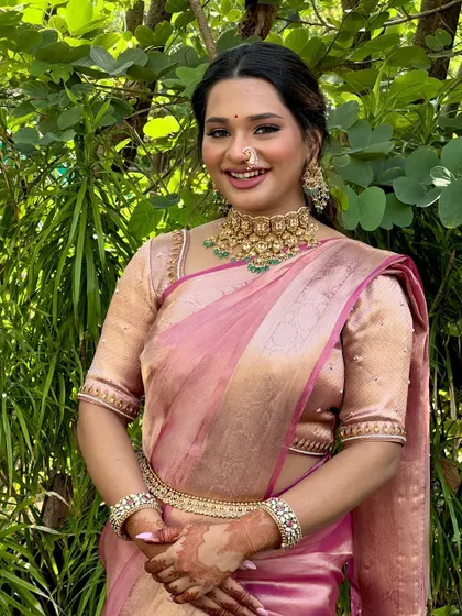 Another angle of this beautiful bride. The makeup is subtle enough to let the traditional jewelry be the star.