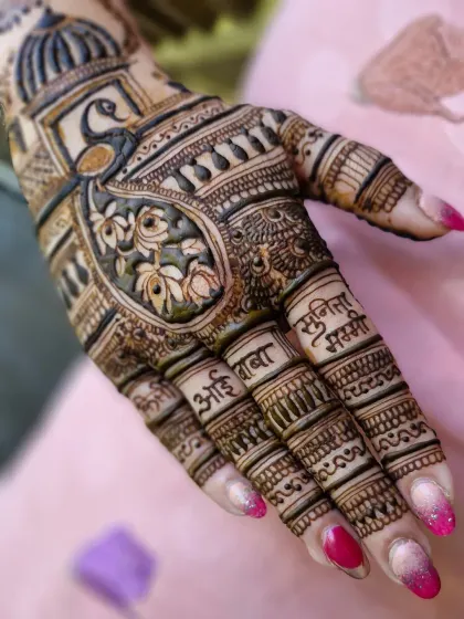 A close-up showing how I incorporate the names of important family members like 'Aai Baba' (Mom Dad) and 'Sunita Mummy' in beautiful Devanagari script.
