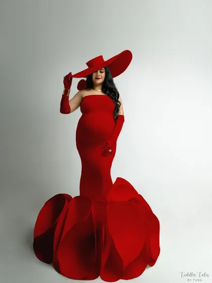 This is more than a dress; it's a statement. For the mother who is bold, powerful, and unapologetically glamorous, I create portraits that are pure art. This is your moment to embrace your inner queen, and I am here to capture every bit of that fire.