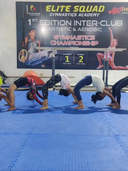 A "bridge train" with our girl's team. This is a fun way to work on back flexibility and endurance as a group.