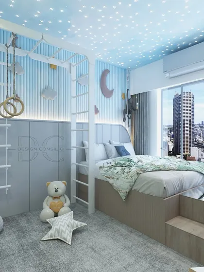 A magical space-themed kids' room. The ceiling is dotted with fiber-optic stars, and the bed is part of a custom unit that includes a play area with gymnastic rings and a ladder. It's a room designed for dreams and adventures.