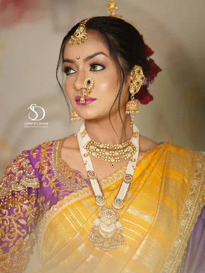 A close up showcasing the flawless base and soft eye makeup of this Marathi bridal look.