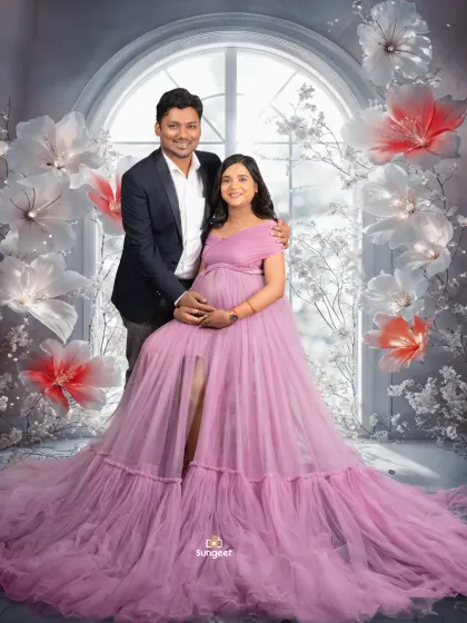 A classic seated portrait of the couple in our winter wonderland setup. The husband's embrace shows love and support.