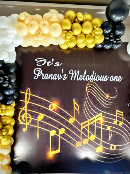 A close-up of the music-themed backdrop.