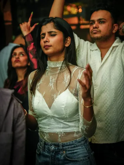 Hands up in praise of the music. The crowd's passion is what drives me.