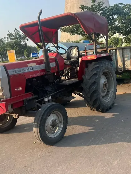 We own and operate a fleet of heavy-duty equipment, including tractors like this one. This allows us to efficiently handle large-scale landscaping projects, from soil preparation to material transport.