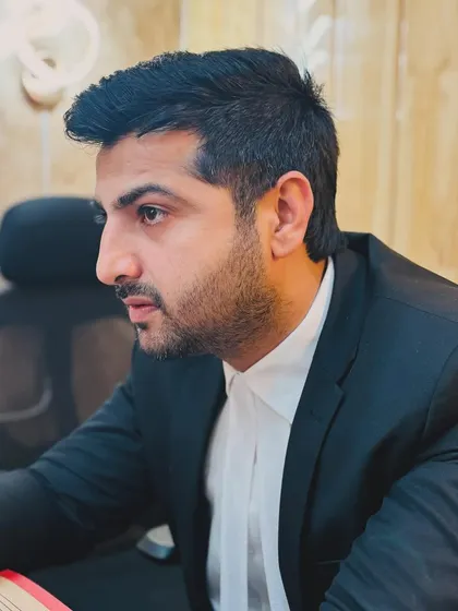 A side profile shot while working. Concentration is key when drafting legal documents.