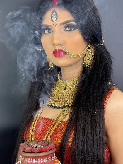 A powerful and divine makeup look inspired by the goddess Durga, created for a festive photoshoot.