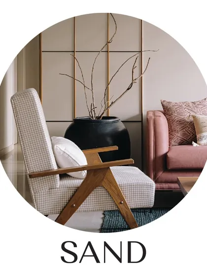 A detail from our 'Sand' project, showing a custom armchair with a beautiful wooden frame. We focus on creating furniture that feels both elegant and comfortable, using natural materials and timeless designs.