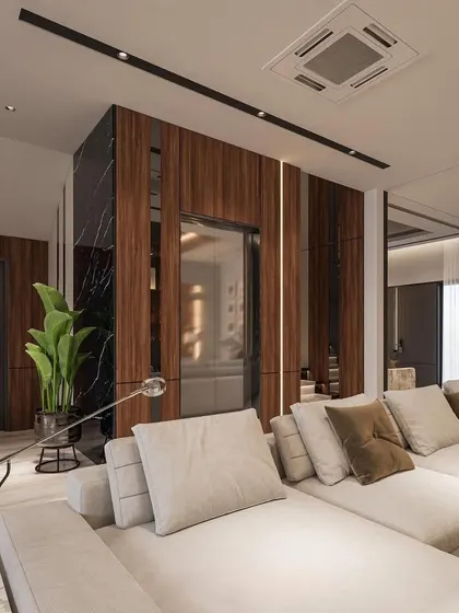This 3D render shows a luxurious living room with a large neutral sofa, wood and marble wall paneling, and a seamless connection to the outdoors. It visualizes our concept for a high-end, open-plan living space.