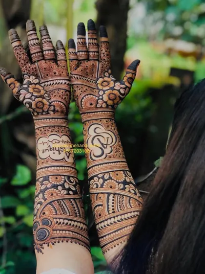 A modern and creative design featuring the word "Unique" and the couple's initials, surrounded by bold floral and geometric patterns.
