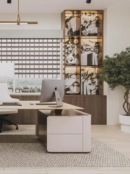 This angle highlights the custom bookshelf with its unique marble backing, adding a touch of luxury to the office.