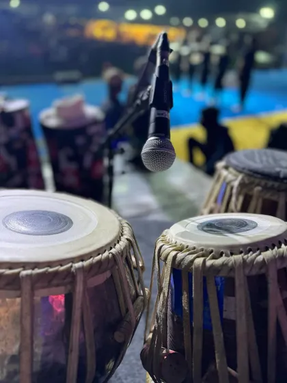 A close-up of my tabla setup on stage at a large event in Goa. This perspective shows the professional miking techniques used to capture the best possible sound during a live performance.