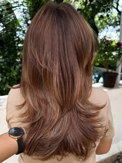 Another angle of the 'Hair Transformation' cut, showing how the layers look from the side.