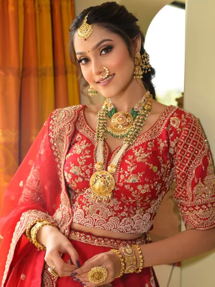 This close-up highlights the flawless base and soft, defined features of the bride. The makeup is designed to look stunning in photographs while feeling lightweight and comfortable.