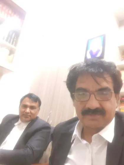 A moment with my colleague Rajesh Khari Gujjar ji in the chamber. The life of a lawyer is about navigating professional challenges together.
