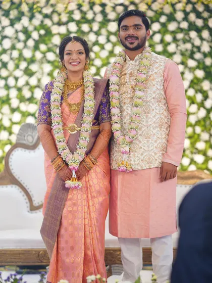 A full-length shot of the beautiful couple. The bride's makeup is elegant and timeless, perfect for creating lasting memories.