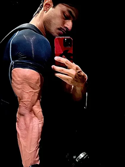 I was standing defeated by time. A shot of my shredded arm, symbolizing the fight against time and expectations.