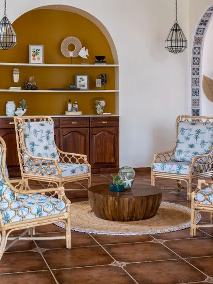 The living area of our Goan villa project, which won runner-up at the WADE ASIA awards. We used cane furniture and a bold mustard arch to create a vibrant, tropical feel.