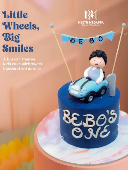 Little wheels, big smiles! This fun car-themed cake for Bebo's first birthday features a handcrafted boy in a blue convertible.