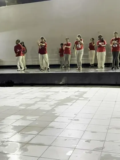 Another shot of our students performing in the rain. Their dedication to the performance and to each other is truly inspiring to watch.