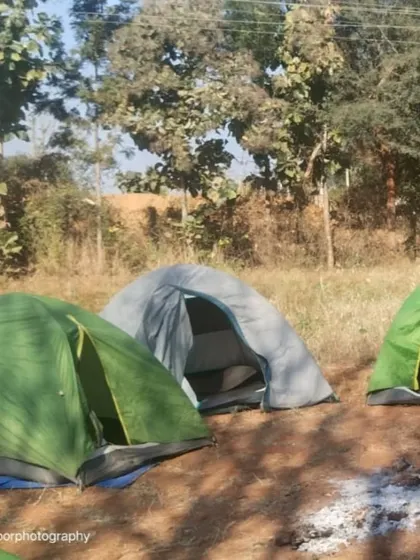 Our tents pitched in the morning light. Camping is a core part of this weekend adventure.
