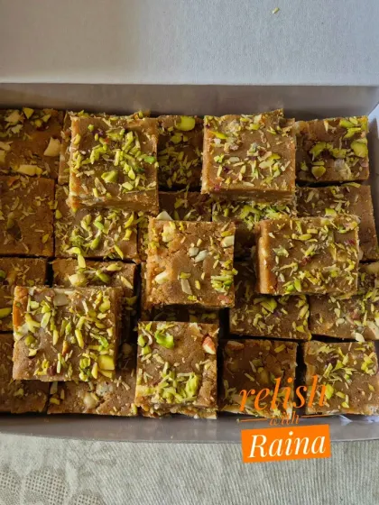A full box of my jaggery-based Adadiya Pak. The rich brown color and nutty topping make it as appealing to the eyes as it is to the palate.