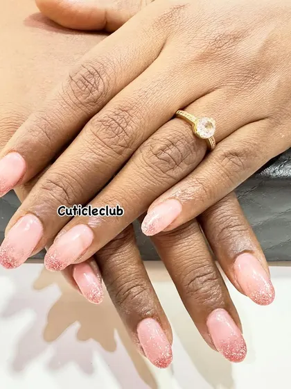 A subtle pink ombre with a fine glitter fade at the tips. This is a beautiful and elegant choice for any occasion.