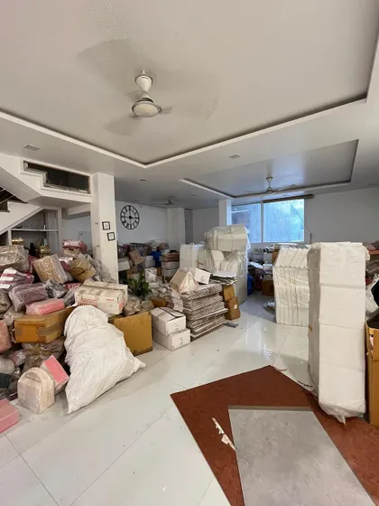 The calm before the storm. Our old office space, completely filled with inventory as we prepared to move.