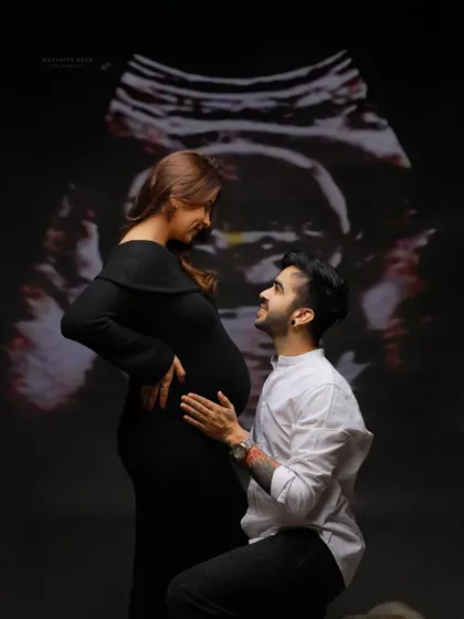 A unique and modern concept where we project the baby's ultrasound scan onto the background. It's a beautiful way to visually connect the parents with their unborn child.