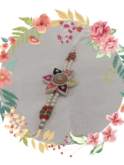 A colorful rakhi made using the paper quilling technique. Learn how to apply your crafting skills to create beautiful and meaningful festive items.