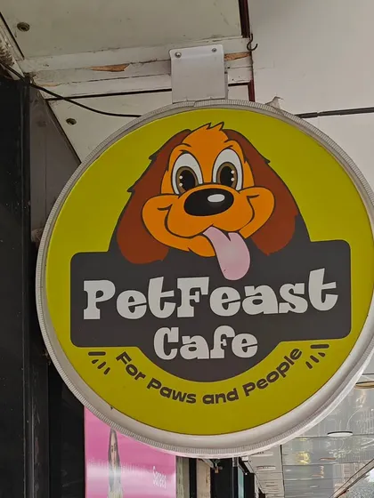 The PetFeast Cafe sign is a beacon for pet lovers in Pune. Partnering with such dedicated individuals helps me expand my community and offer more to pet parents.