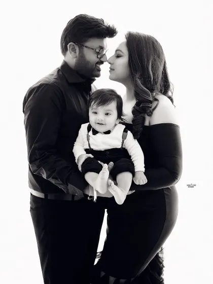 A beautiful black and white version of a classic family pose, adding a timeless and artistic feel.