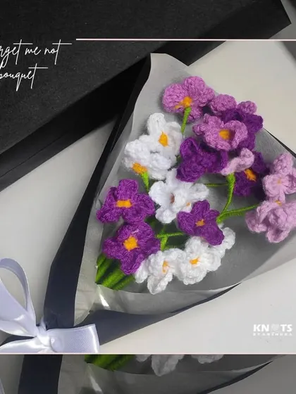 A beautiful "Forget-Me-Not" bouquet, featuring delicate purple and white flowers. It's a meaningful gift that symbolizes true and eternal love.