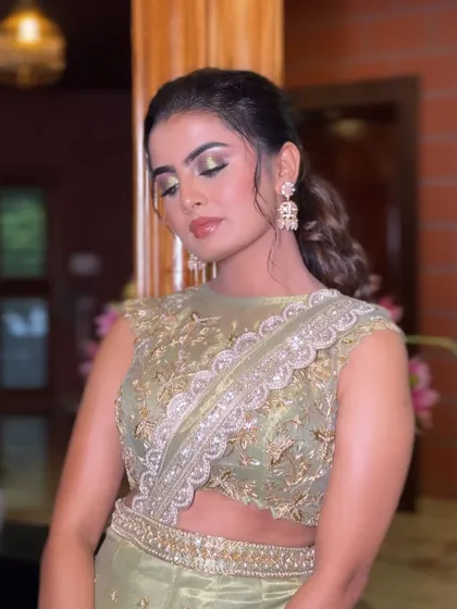 Another angle of the client, showing her glamorous makeup and how the earrings frame her face beautifully.